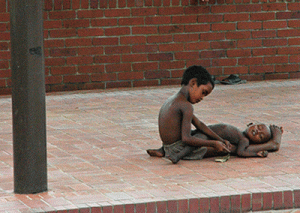 child-beggars-caring-for-each-other-cropped